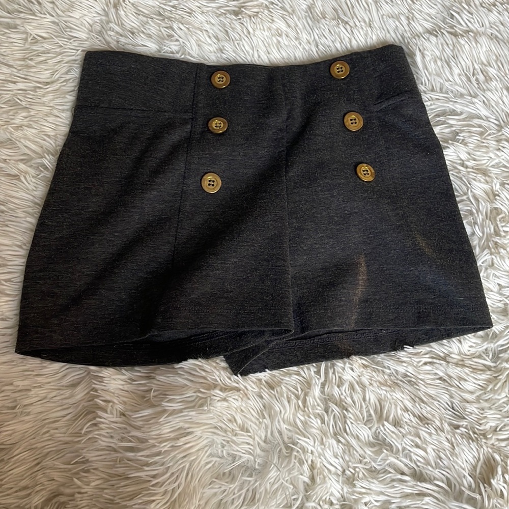 Gray high waisted shorts with gold buttons